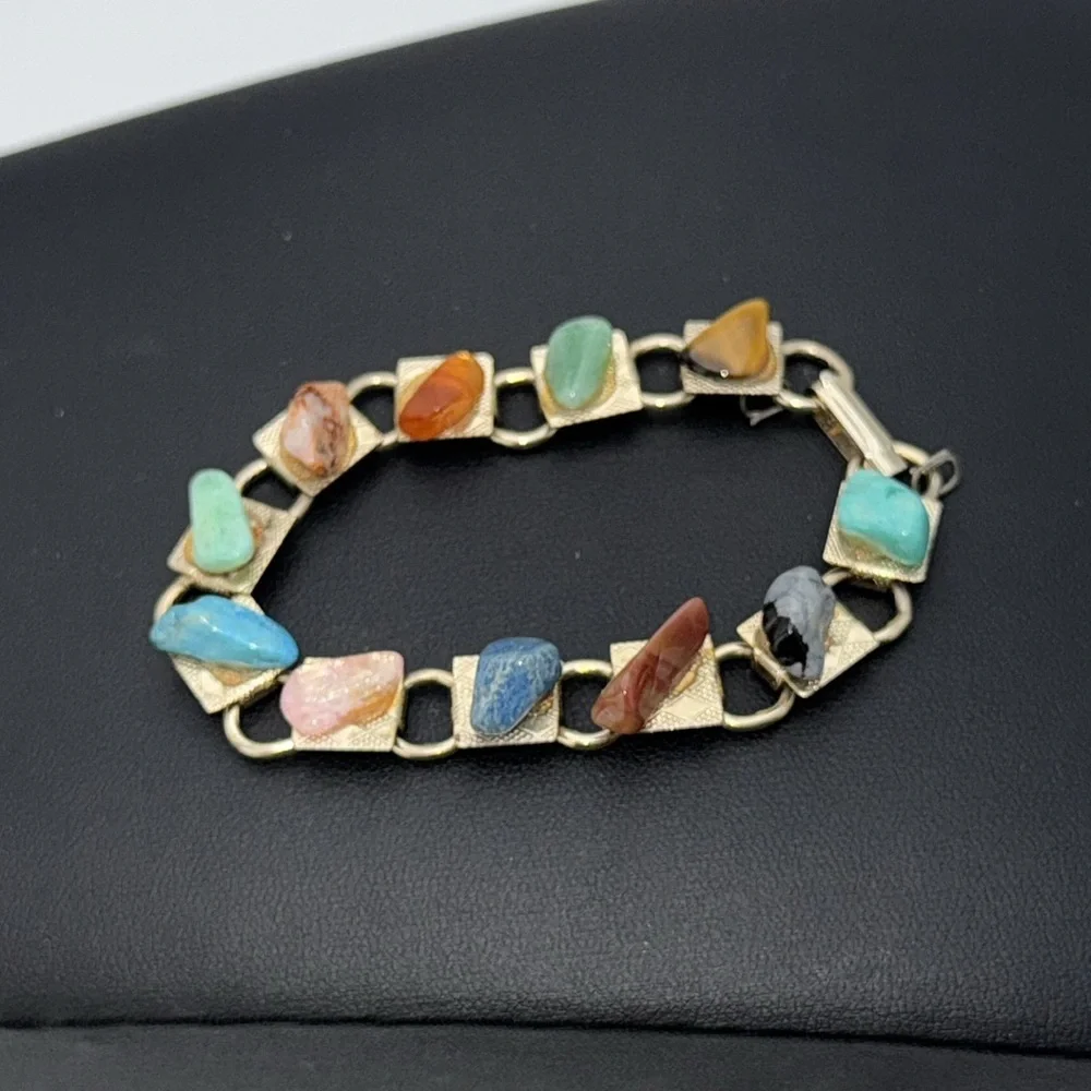 Vintage Gold tone link charm bracelet with various colored “stones” boho hippie